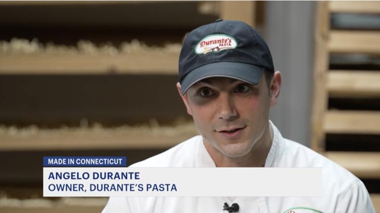 Angelo Durante in the drying room, interviewed for News 12's Made in Connecticut segment